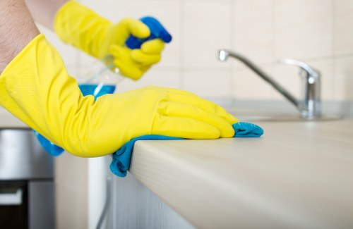 Cleaning an office kitchen and shared facilities in SW14